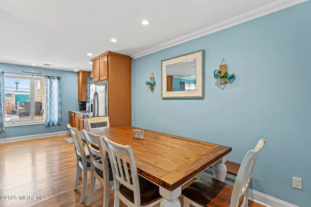 a bedroom with a bed and a table