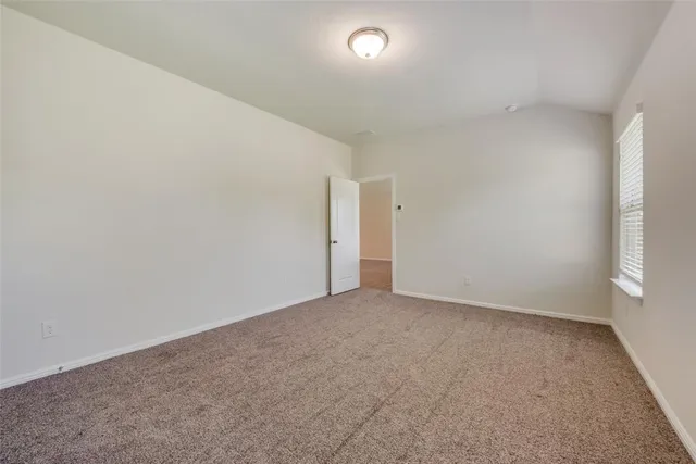 a bathroom with a tub and shower