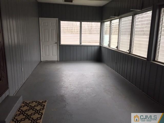 44 Clemson Road Old Bridge, NJ 08859 - Photo 7 of 12 a view of an empty room with a window