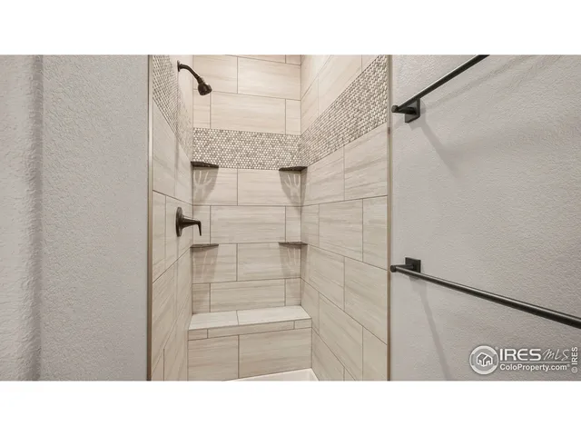 a black and white photo of a bathroom