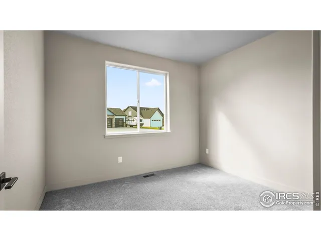 a black and white photo of a living room