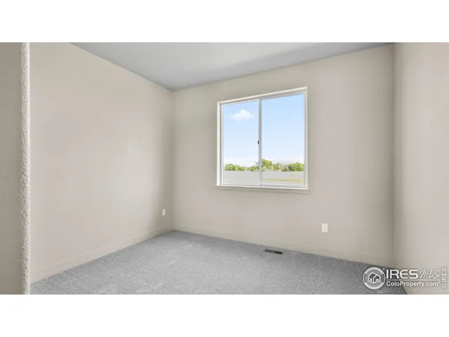 a black and white photo of a living room