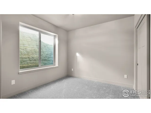 a black and white photo of a living room