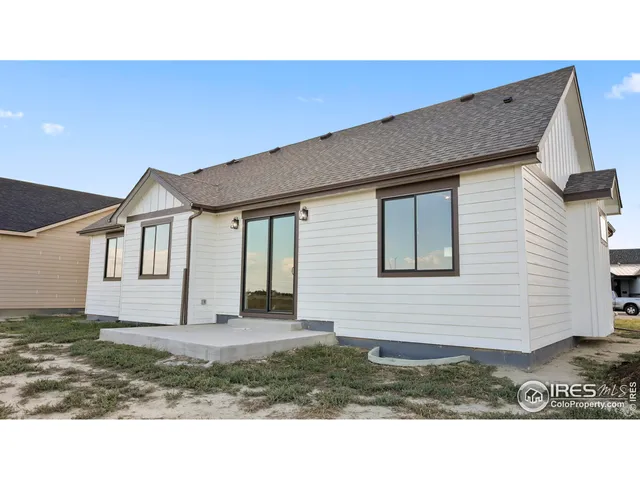 a view of a lake in front of the house