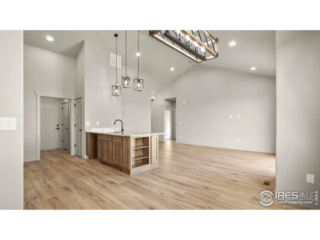 a upper view of a living room and kitchen