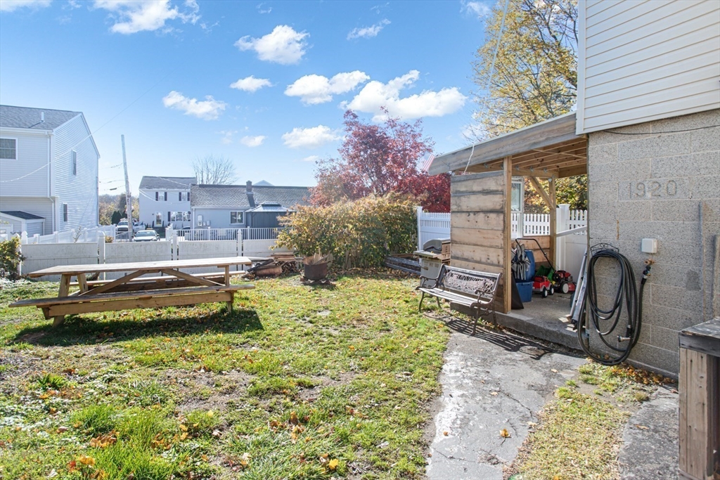 415 Anthony Street Fall River, MA 02721 - Photo 2 of 16 a swimming pool with outdoor seating and yard