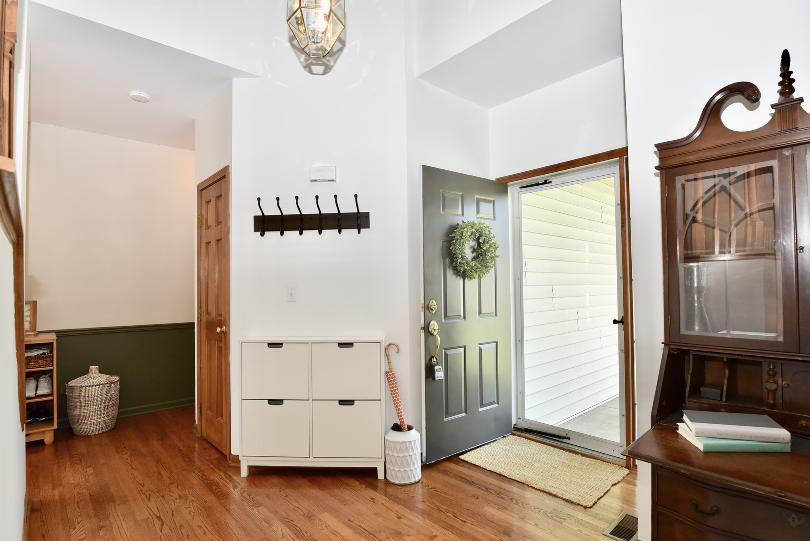 1389 Lily Cache Lane Bolingbrook, IL 60490 - Photo 22 of 45 a view of an entryway with wooden floor