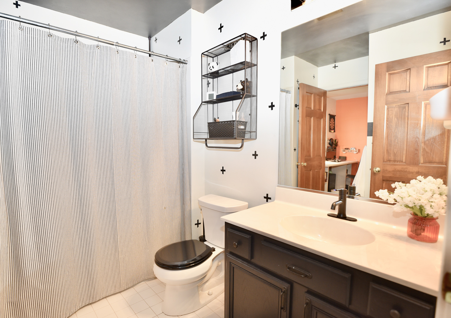 1389 Lily Cache Lane Bolingbrook, IL 60490 - Photo 34 of 45 a bathroom with a sink a toilet and a mirror