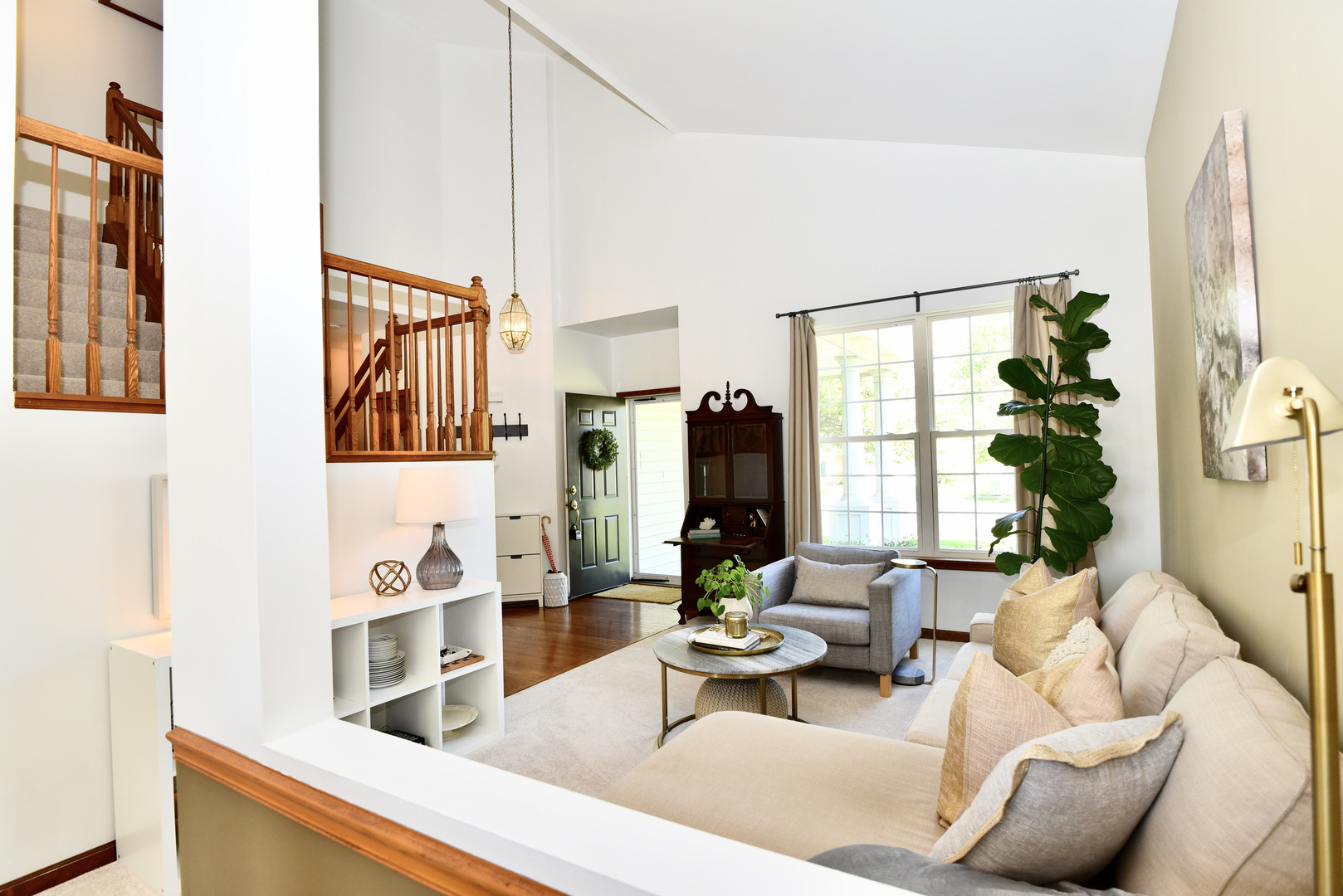 1389 Lily Cache Lane Bolingbrook, IL 60490 - Photo 5 of 45 a living room with furniture and a large window