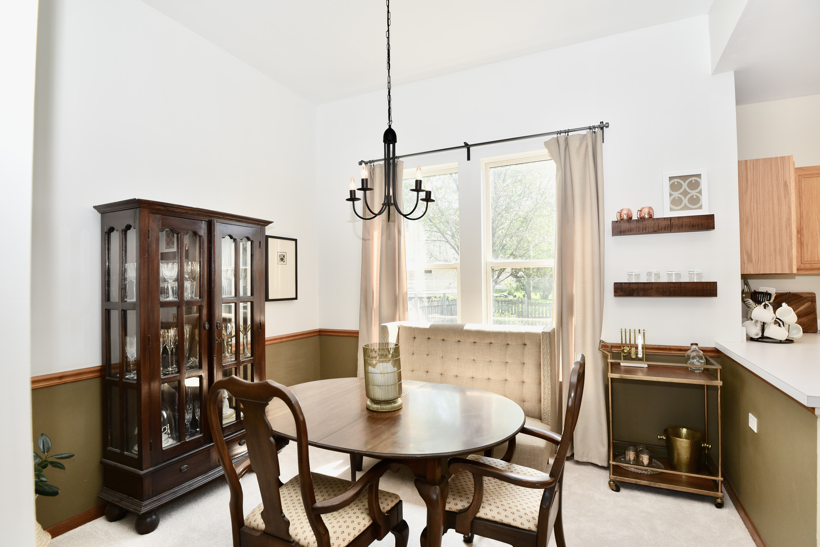 1389 Lily Cache Lane Bolingbrook, IL 60490 - Photo 6 of 45 a view of a dining room with furniture and window