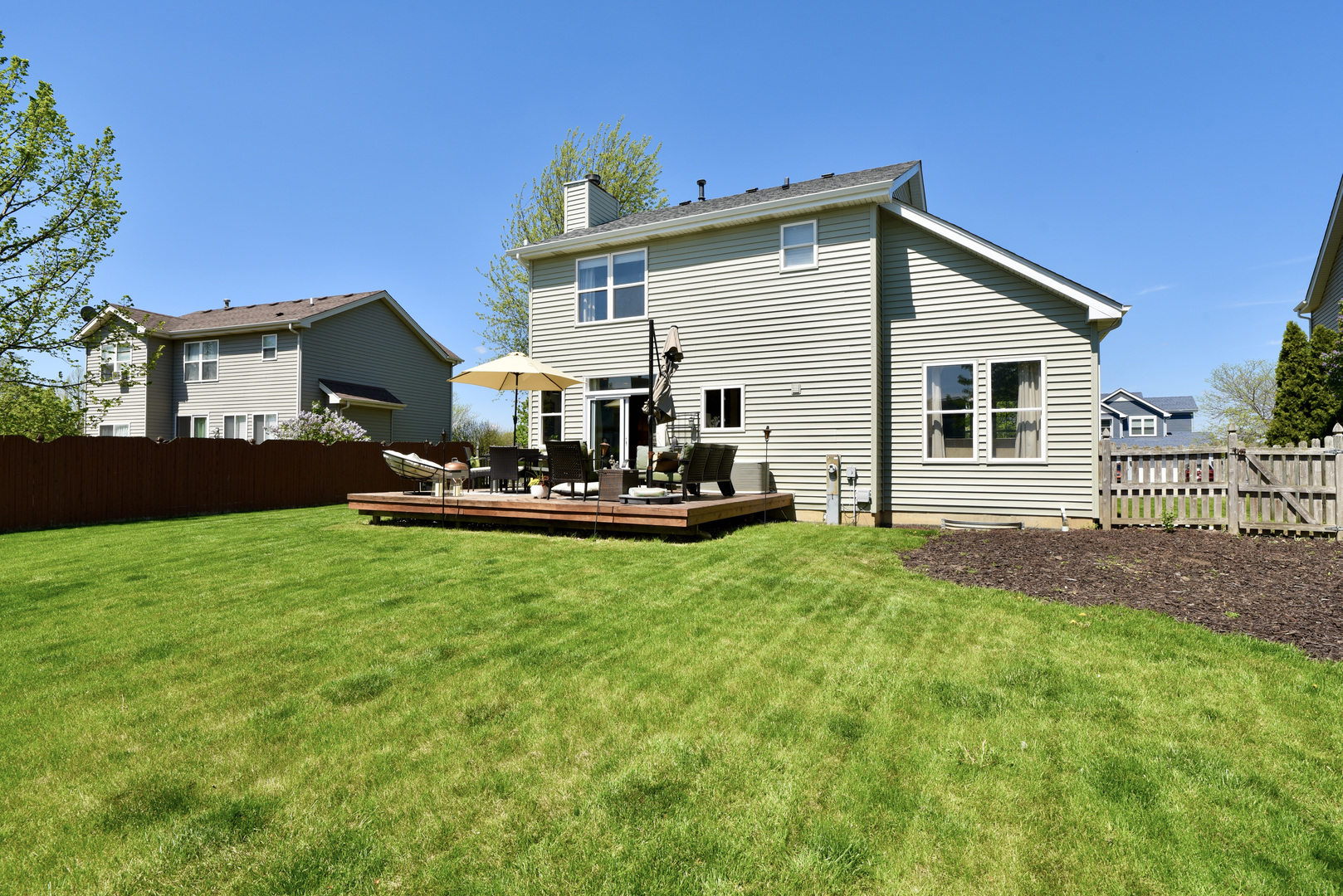1389 Lily Cache Lane Bolingbrook, IL 60490 - Photo 10 of 45 a view of a house with a yard