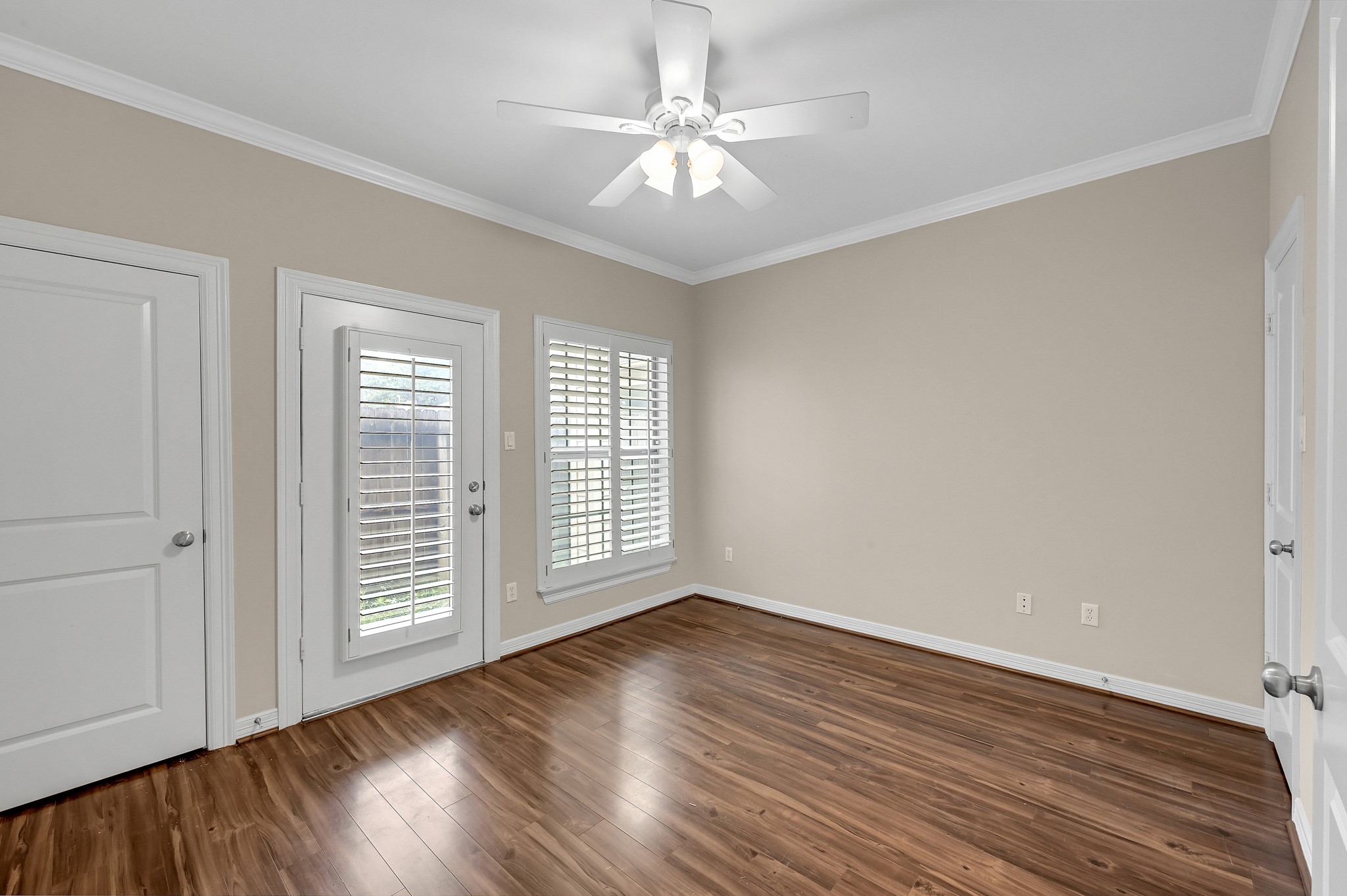 1204 Cohn Street Houston, TX 77007 - Photo 4 of 25 wooden floor in an empty room with a window