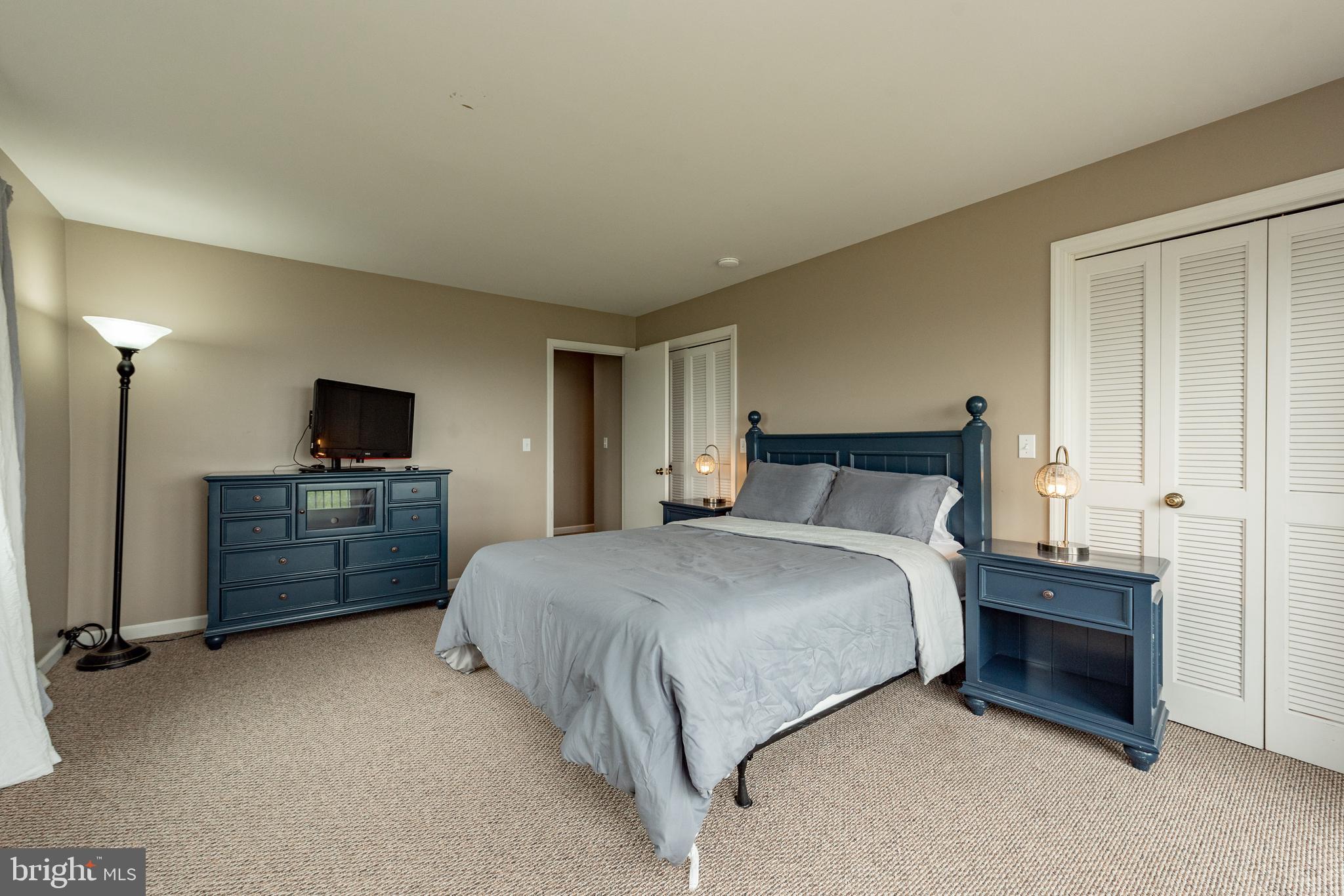 467 Paradise Ridge Road Oakland, MD 21550 - Photo 39 of 64 a bed room with a bed and a television