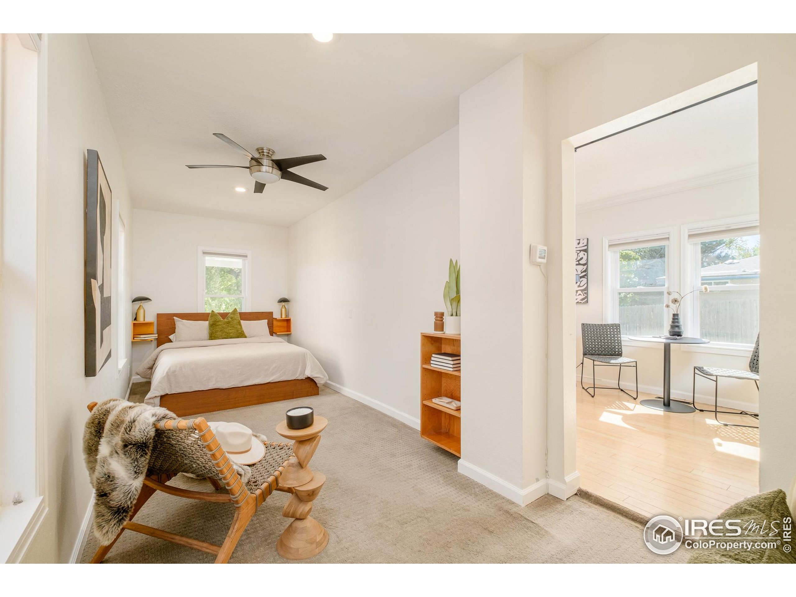 4635 Elm Court Denver, CO 80211 - Photo 11 of 30 a bedroom with furniture and a mirror