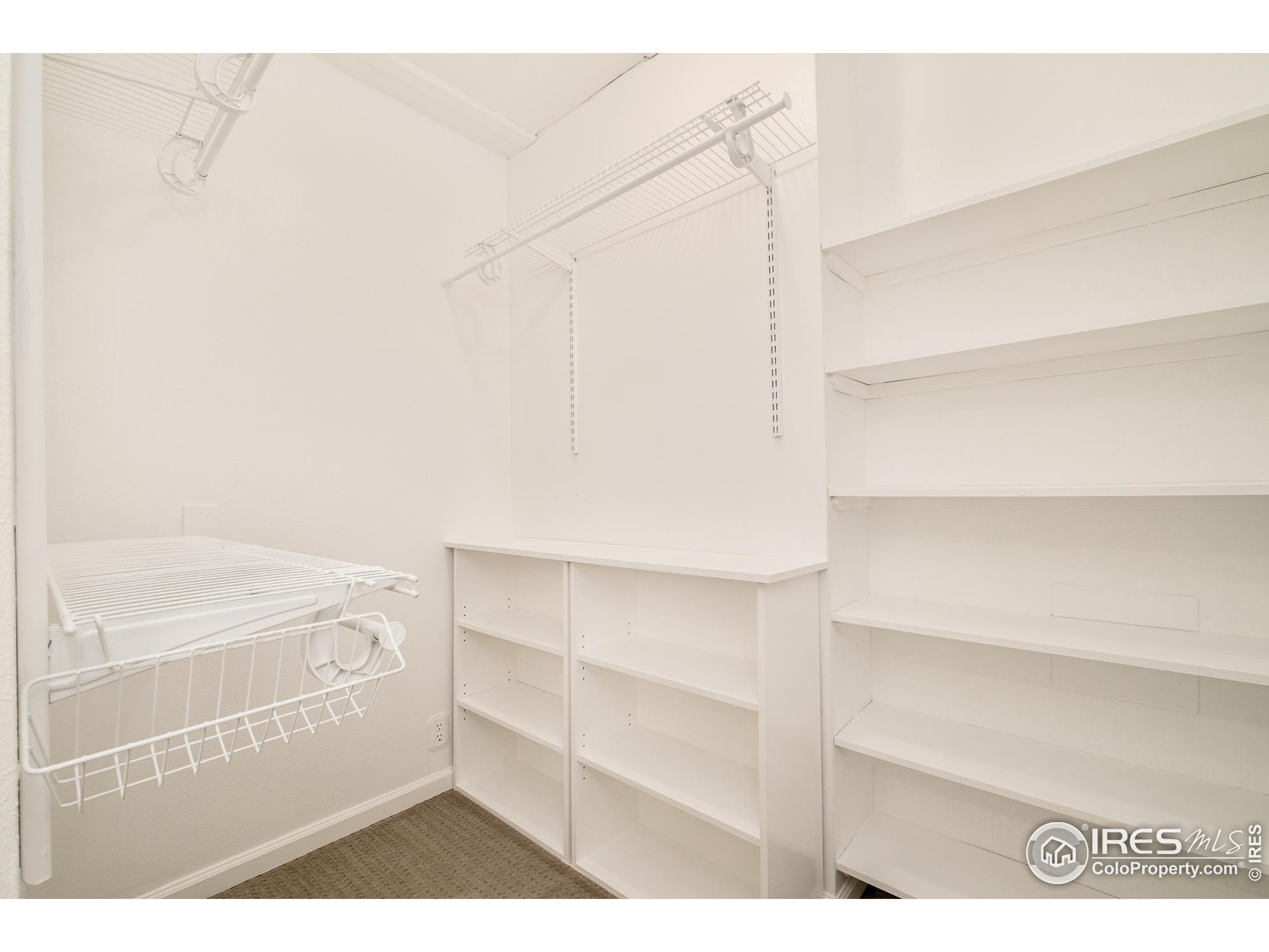 4635 Elm Court Denver, CO 80211 - Photo 14 of 30 a view of an empty walk in closet