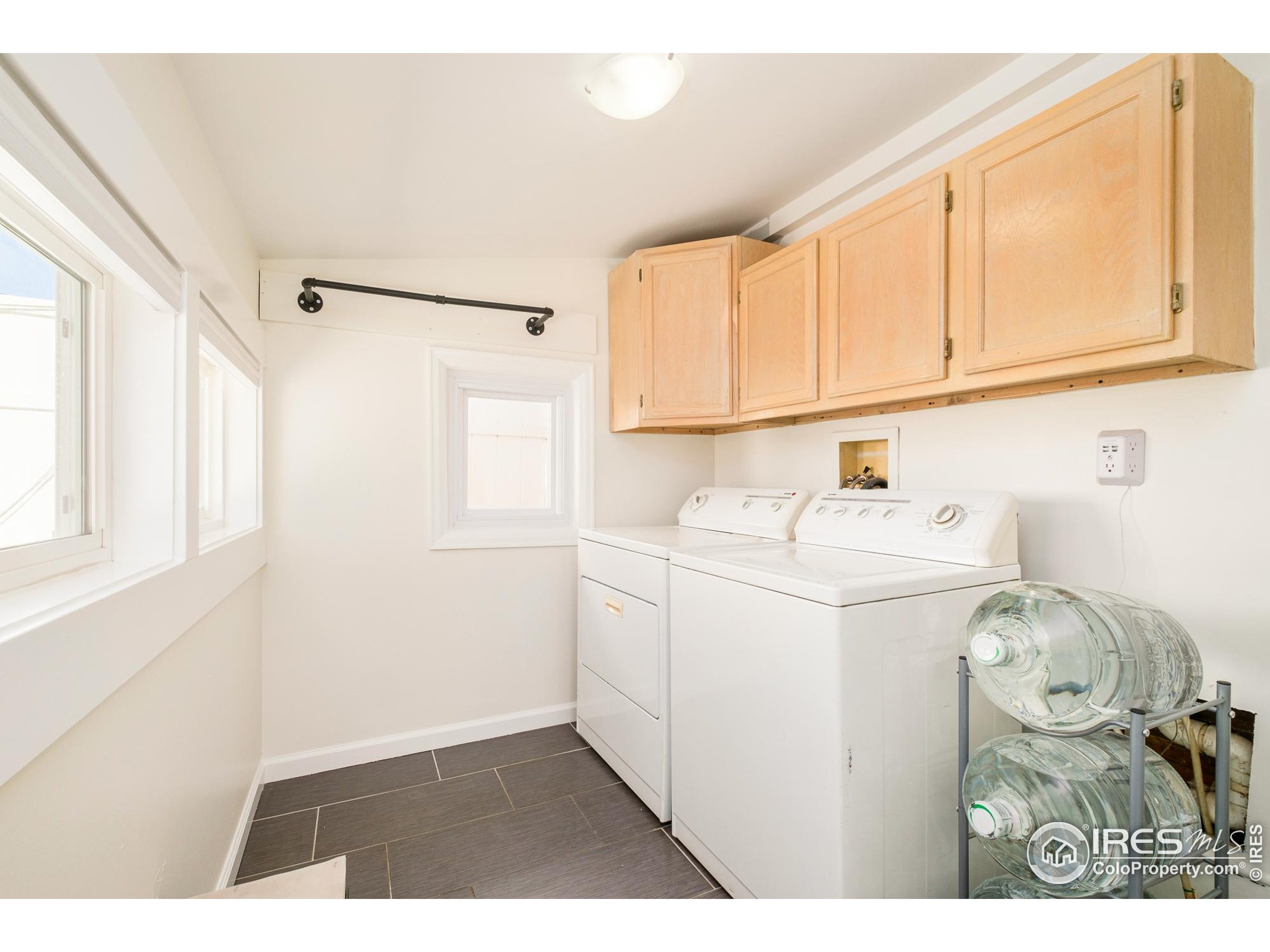 4635 Elm Court Denver, CO 80211 - Photo 19 of 30 a utility room with dryer and washer