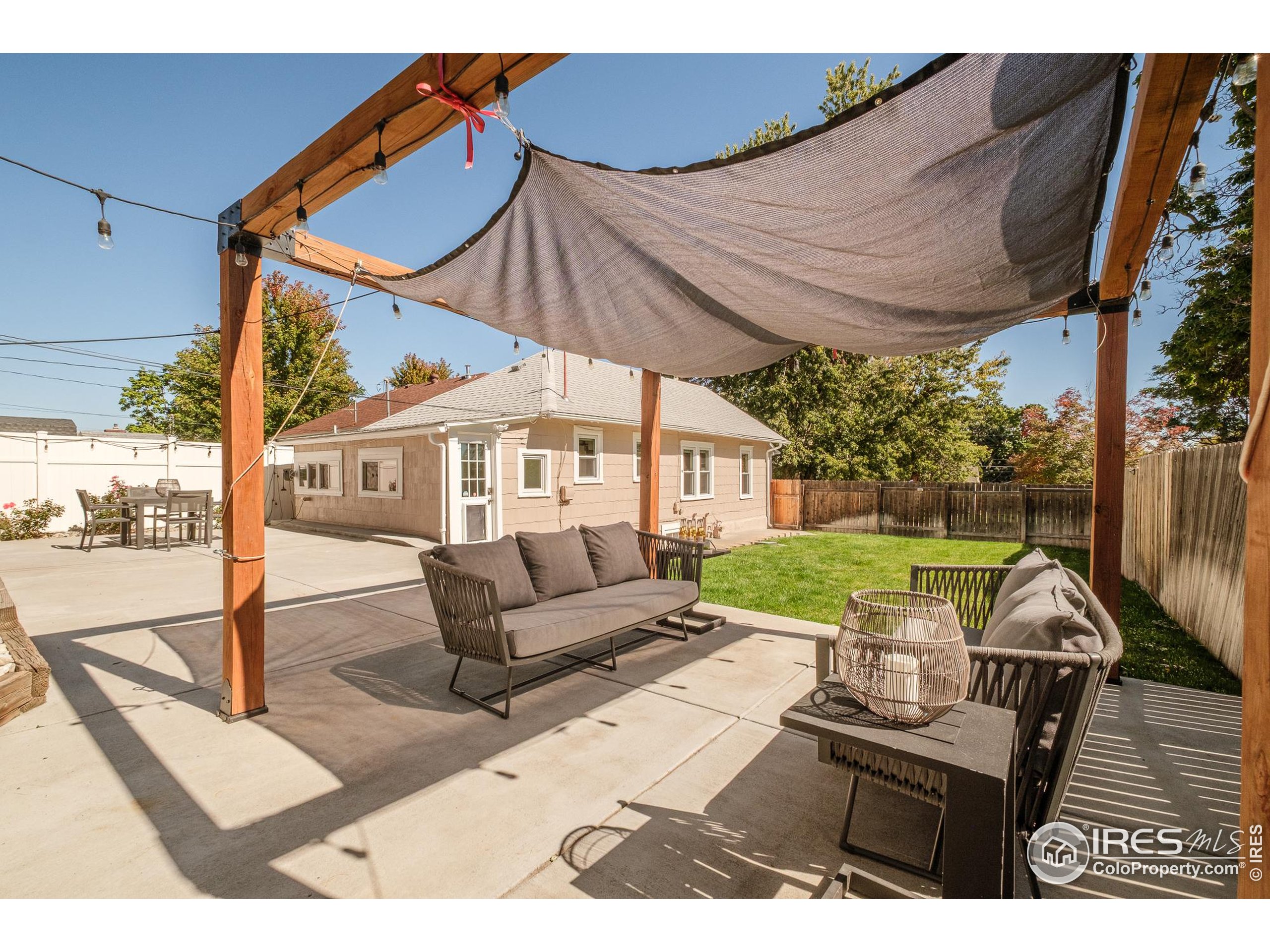 4635 Elm Court Denver, CO 80211 - Photo 22 of 30 a view of a patio with a table chairs and a patio