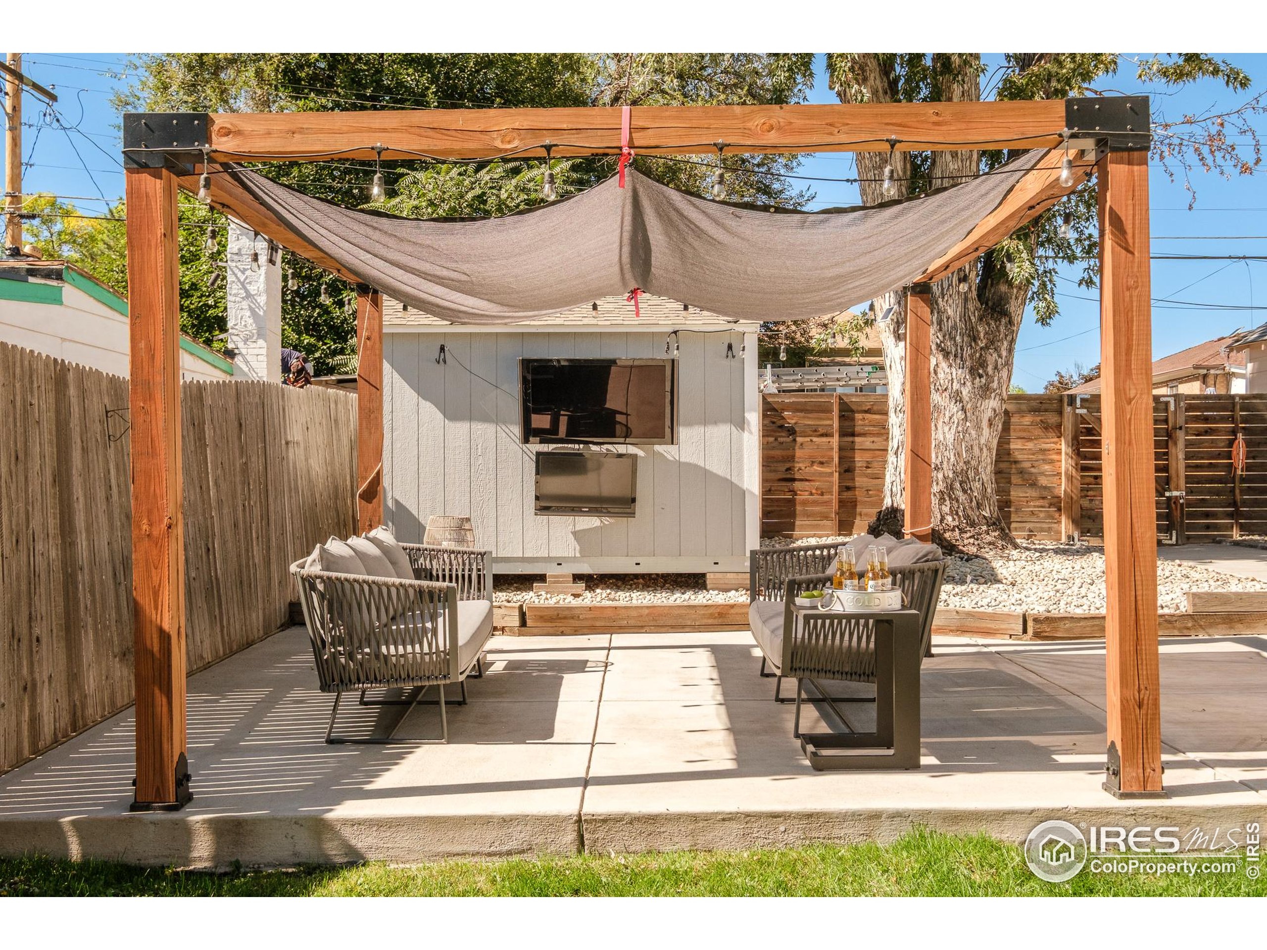 4635 Elm Court Denver, CO 80211 - Photo 24 of 30 a view of a patio with table and chairs