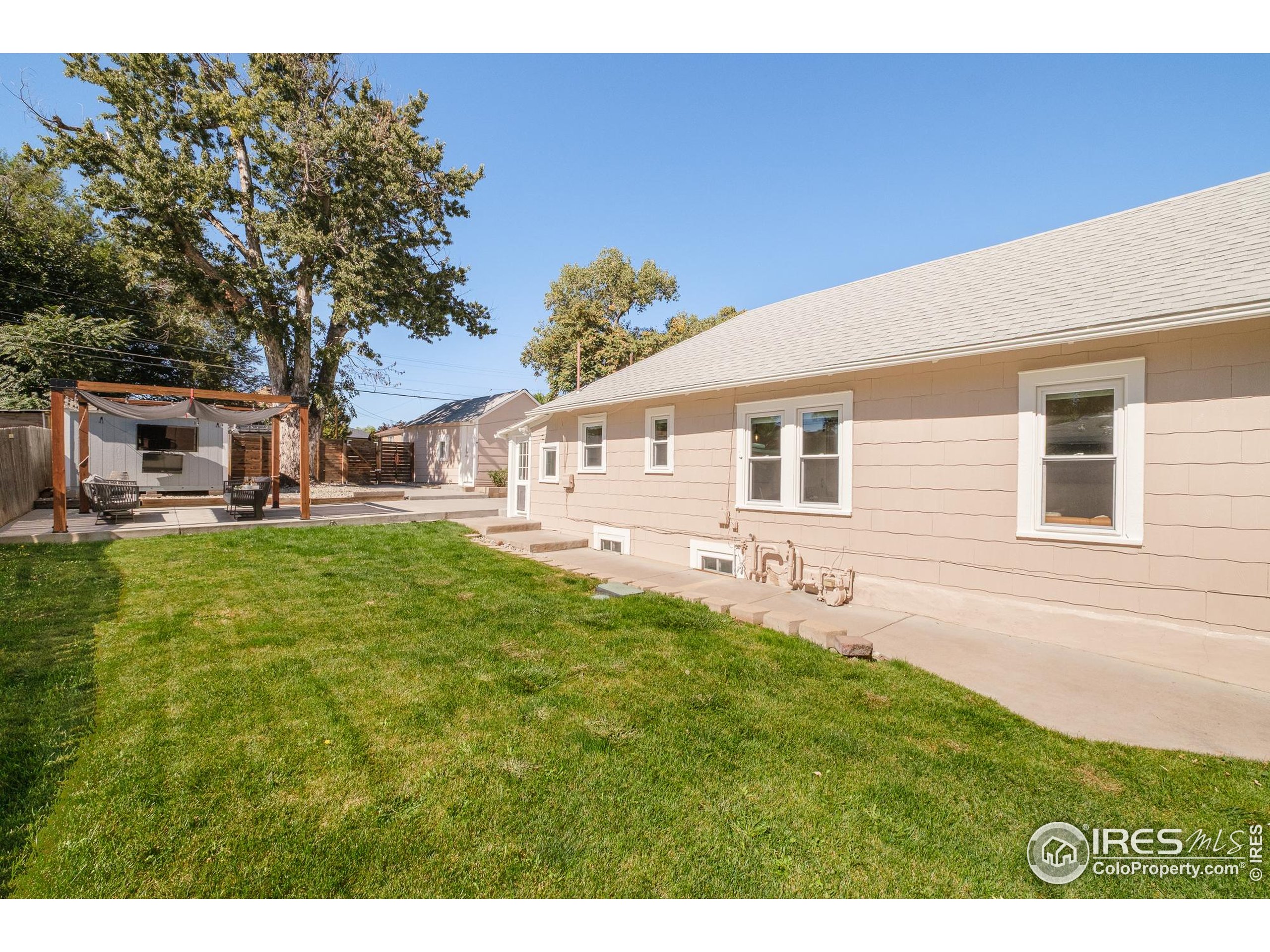 4635 Elm Court Denver, CO 80211 - Photo 25 of 30 a view of a house with a backyard