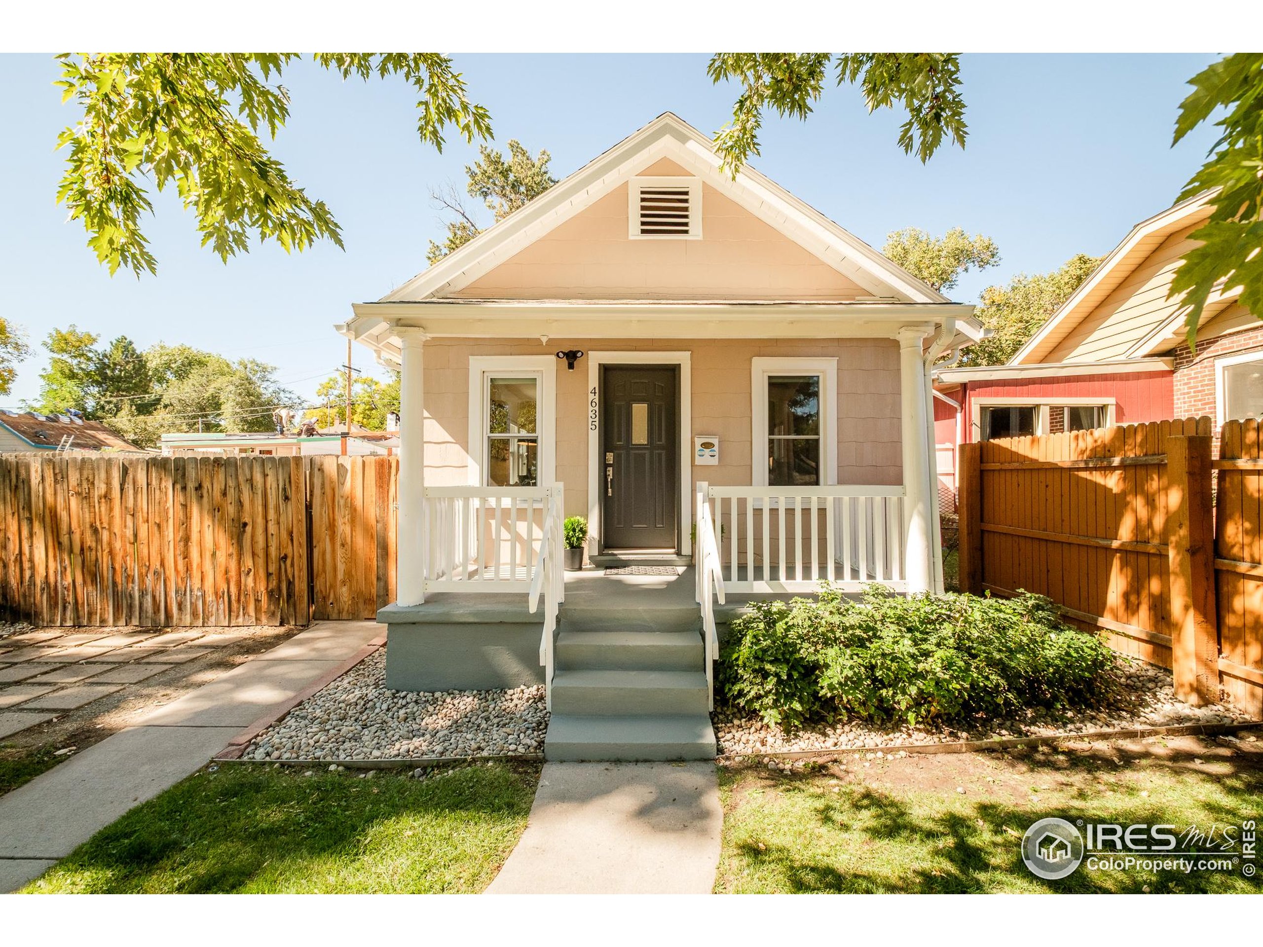 4635 Elm Court Denver, CO 80211 - Photo 28 of 30 front view of a house with a porch