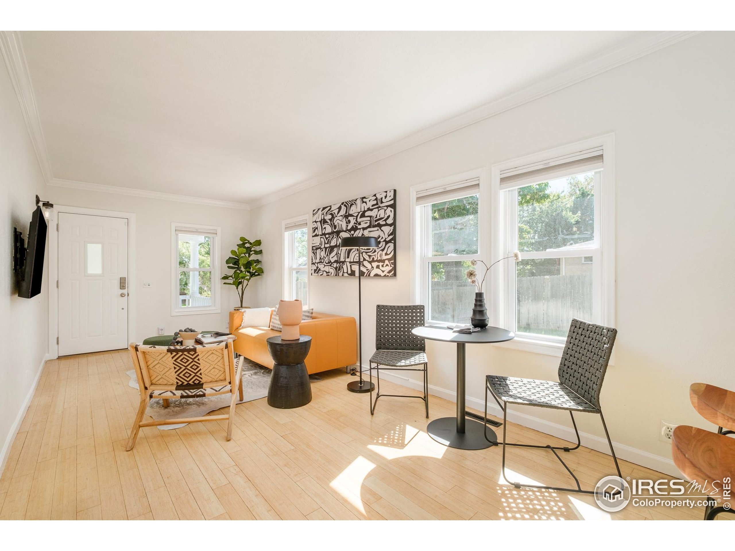 4635 Elm Court Denver, CO 80211 - Photo 7 of 30 a living room with furniture and a window