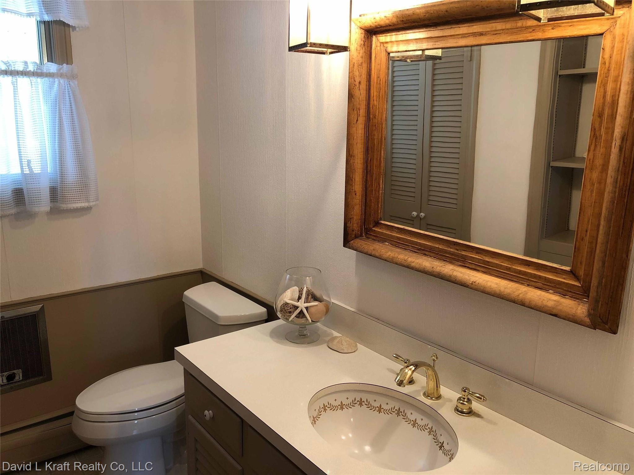 8684 Crescent Beach Road Pigeon, MI 48755 - Photo 11 of 23 8684CBRdBathHf.jpg