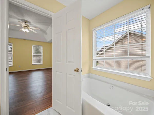 a view of a bathtub in a room