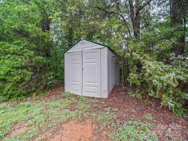 a view of backyard with green space