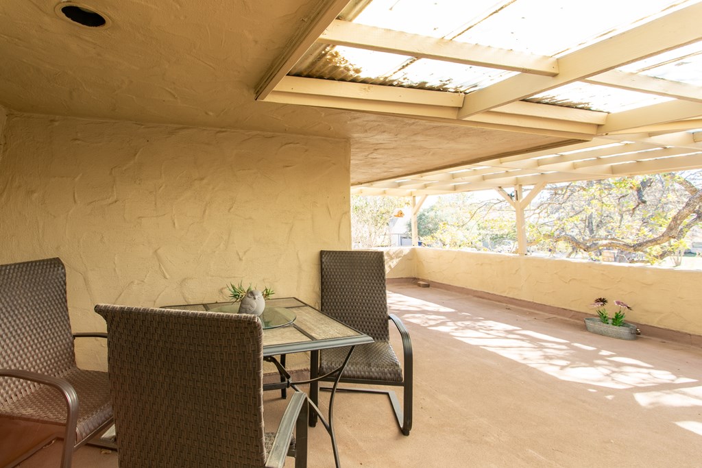 541 D Sand Bend Kerrville, TX 78028 - Photo 39 of 41 a view of a workspace with a table and chair