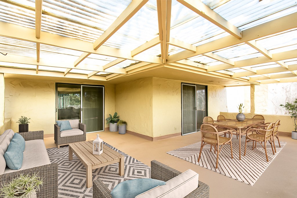 541 D Sand Bend Kerrville, TX 78028 - Photo 6 of 41 a view of a dining room with furniture wooden floor and a rug