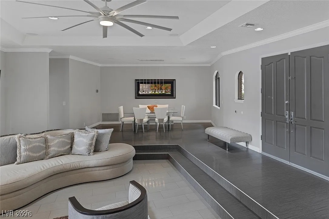 9 Quail Run Road Henderson, NV 89014 - Photo 9 of 57 A spacious living area with varied flooring and grand double entry doors awaits.