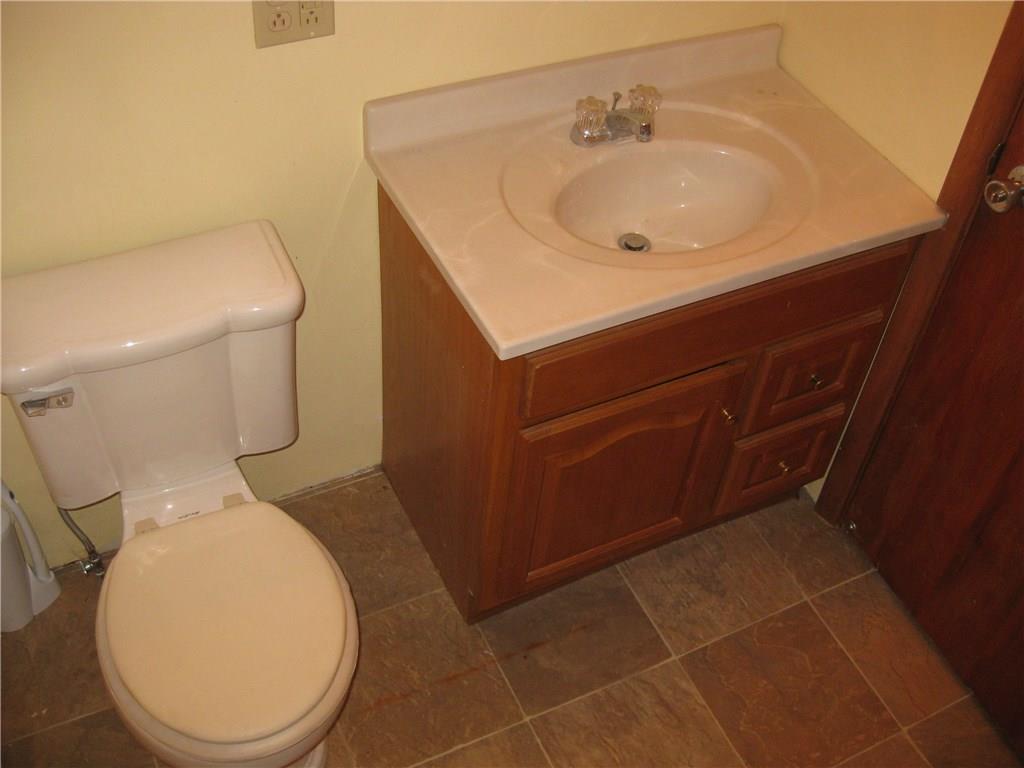2713 Scrubgrass Road Grove City, PA 16127 - Photo 4 of 12 New flooring...toilet and vanity as well as shower!
