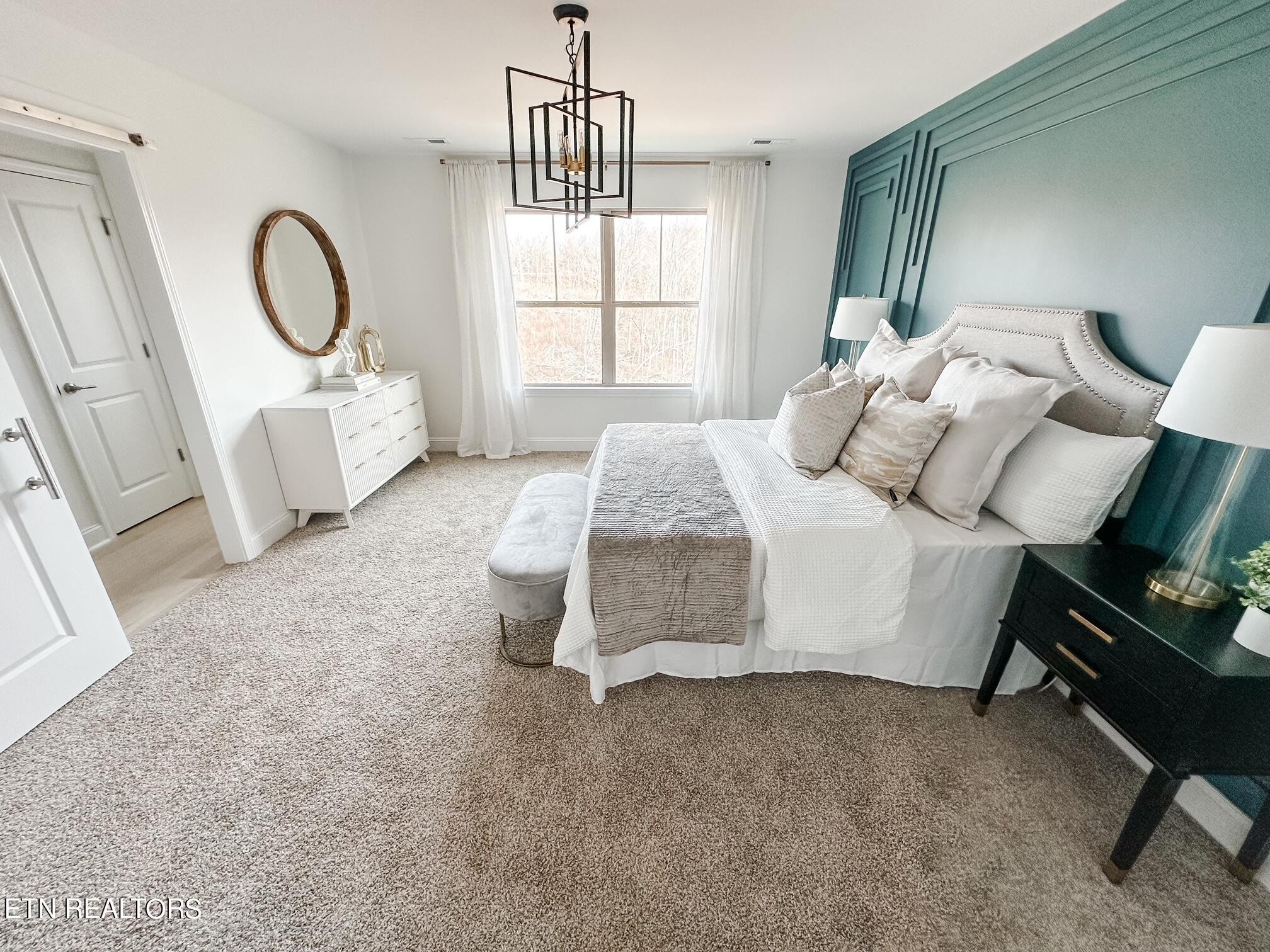 8405 Whisper Lane Powell, TN 37849 - Photo 16 of 39 a spacious bedroom with bed and a window