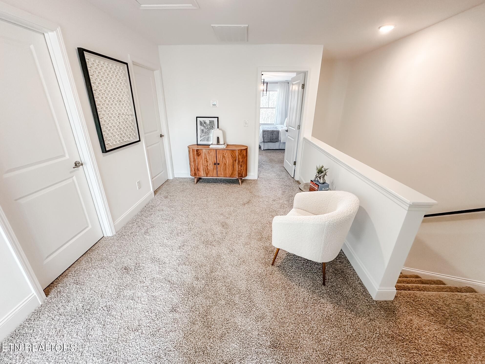 8405 Whisper Lane Powell, TN 37849 - Photo 25 of 39 a spacious bedroom with a bed and a mirror