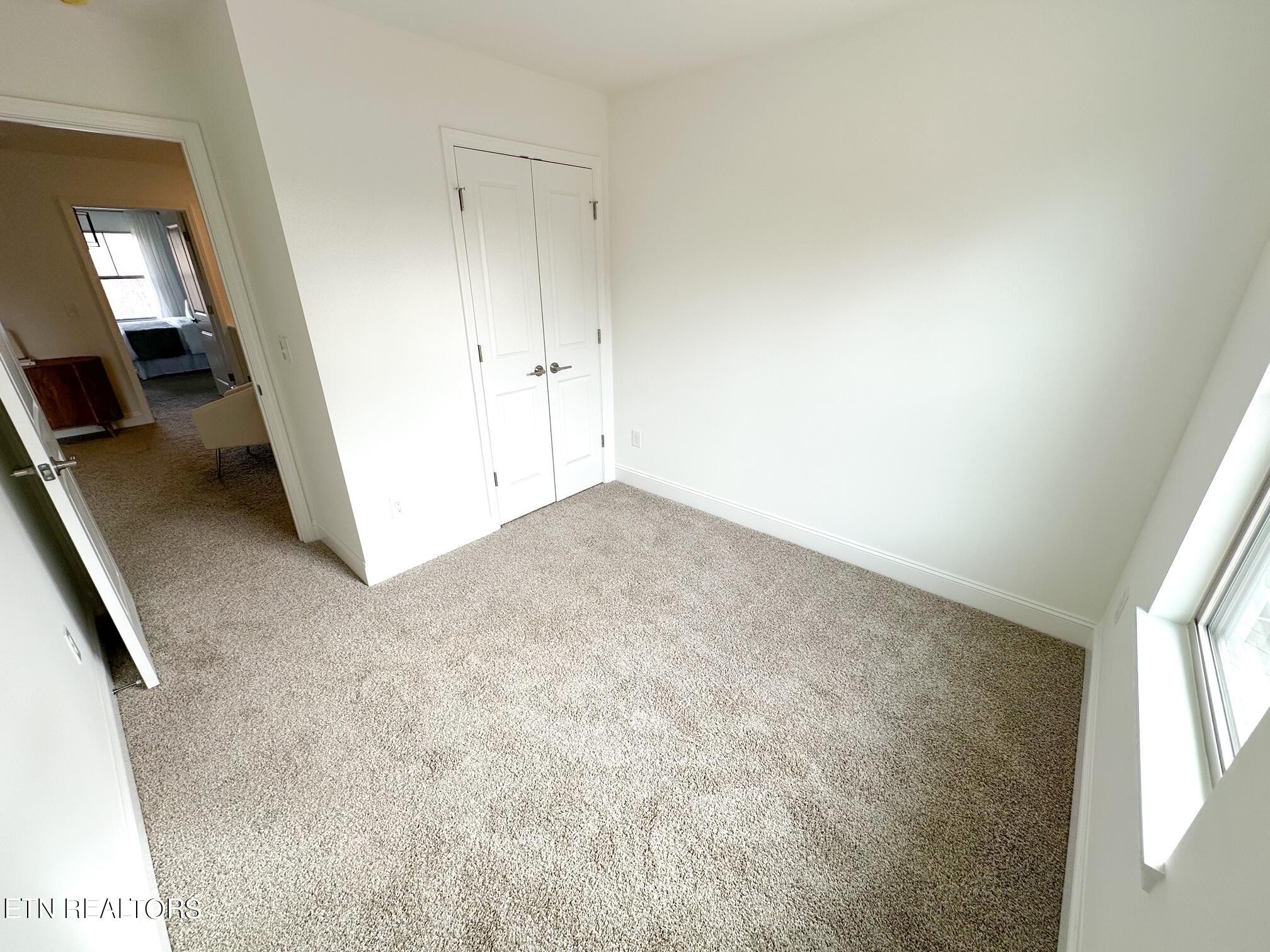 8405 Whisper Lane Powell, TN 37849 - Photo 34 of 39 a view of an empty room and a window