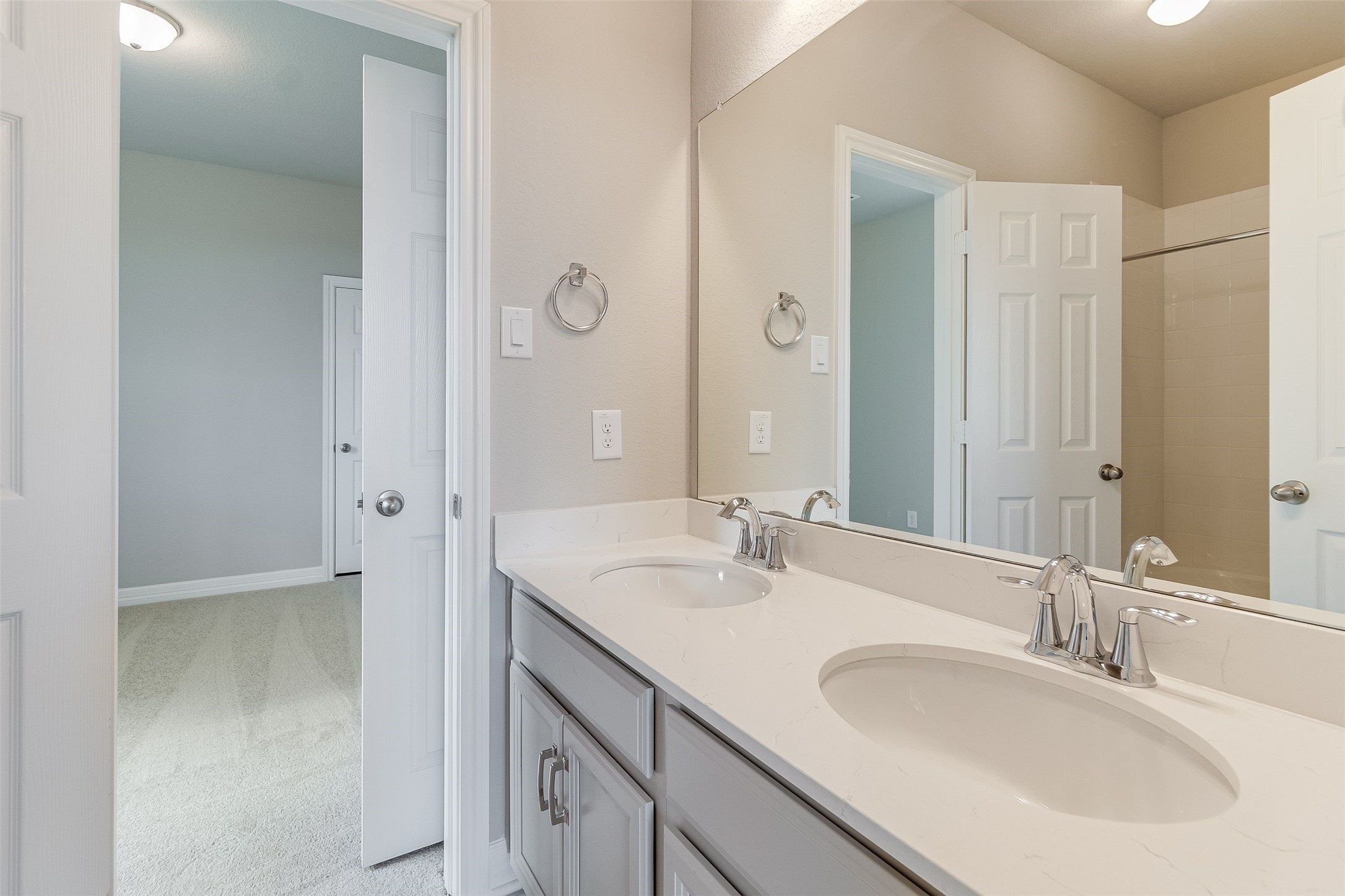 7907 Jasper Meadows Way Angleton, TX 77515 - Photo 13 of 34 a bathroom with a sink and a mirror