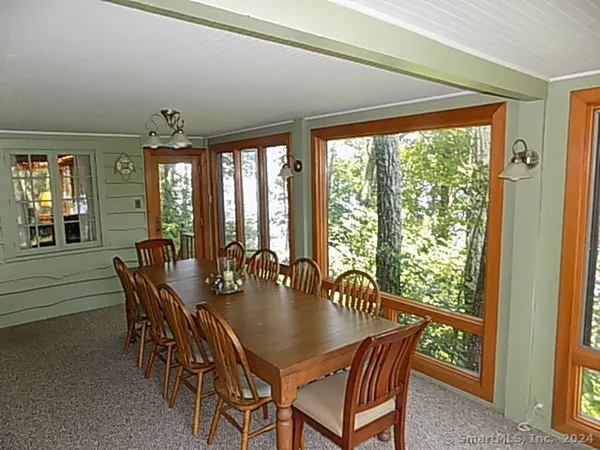 a kitchen with a refrigerator and a sink