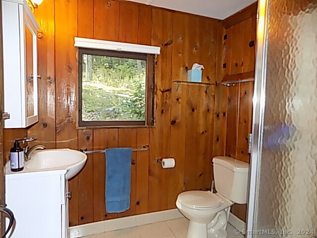 3 Partridge Lane New Fairfield, CT 06812 - Photo 20 of 26 a bathroom with a sink a toilet and shower