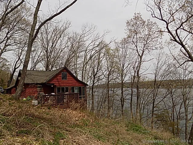 an aerial view of house with yard