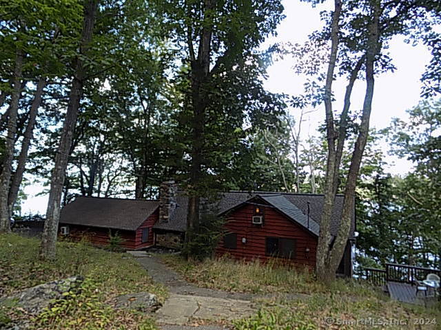 3 Partridge Lane New Fairfield, CT 06812 - Photo 25 of 26 a house is sitting in middle of forest
