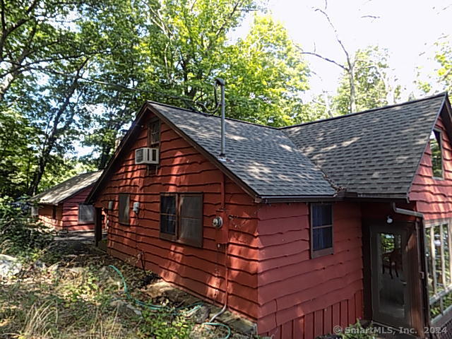 3 Partridge Lane New Fairfield, CT 06812 - Photo 10 of 26 a front view of a house with a garden