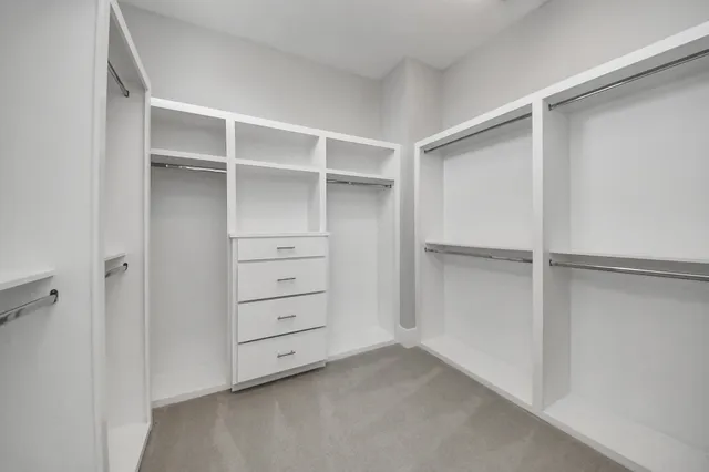a view of an empty walk in closet