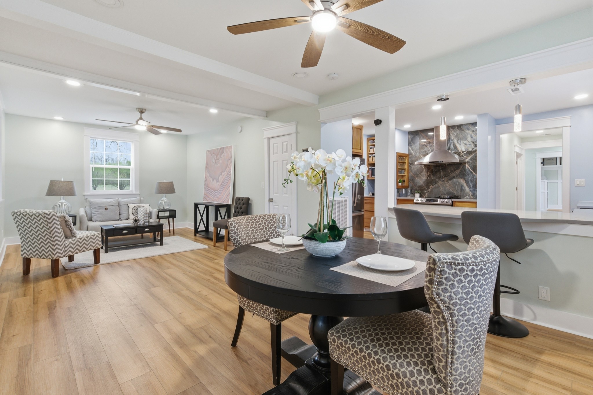 1237 Abiff Road Bon Aqua, TN 37025 - Photo 12 of 37 a view of a dining room with furniture and wooden floor