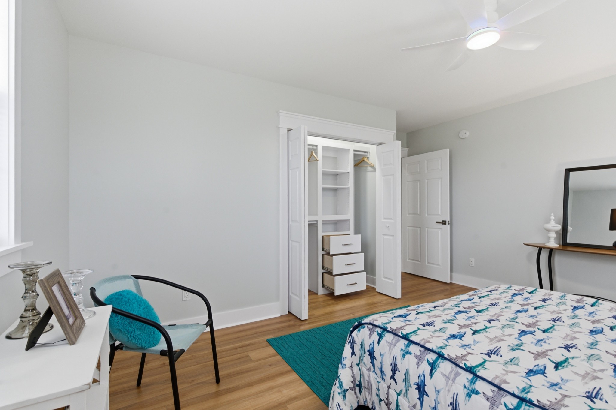 1237 Abiff Road Bon Aqua, TN 37025 - Photo 26 of 37 a bedroom with a bed and a chair in it