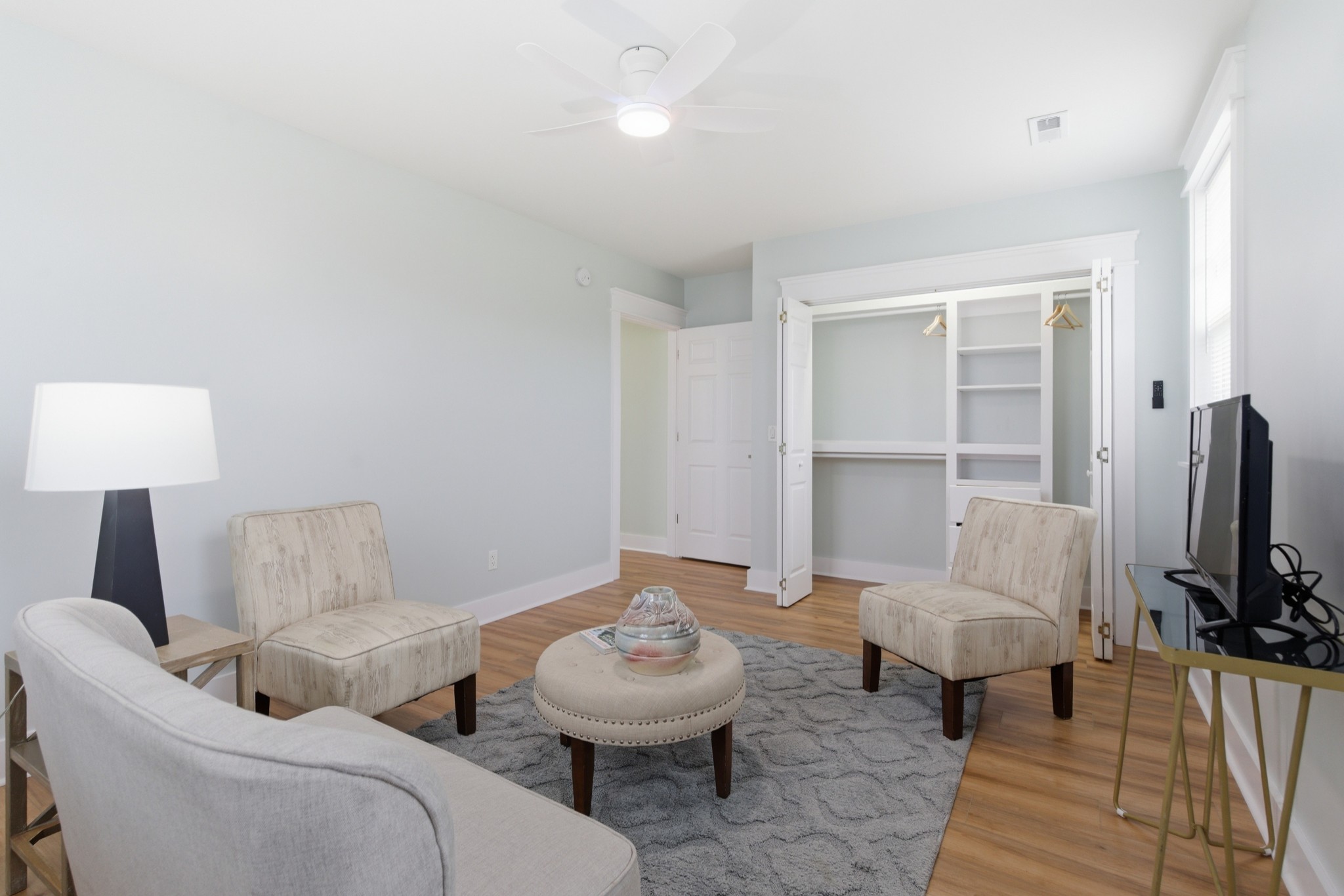 1237 Abiff Road Bon Aqua, TN 37025 - Photo 28 of 37 a living room with furniture and a flat screen tv