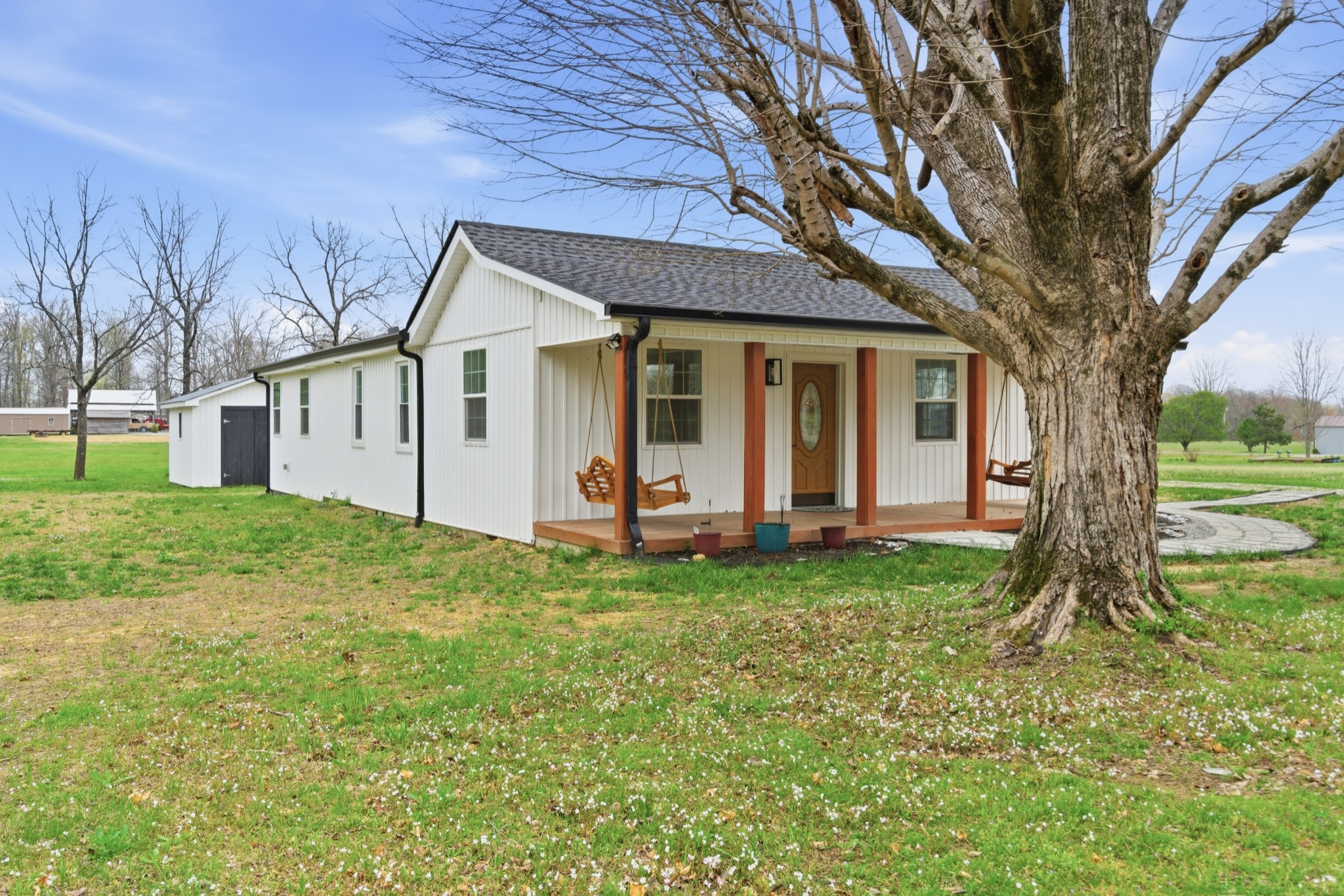 1237 Abiff Road Bon Aqua, TN 37025 - Photo 3 of 37 a view of a house with a yard