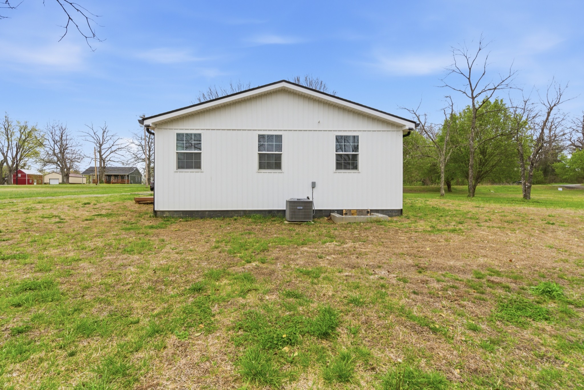 1237 Abiff Road Bon Aqua, TN 37025 - Photo 34 of 37 a view of an house with backyard space and garden