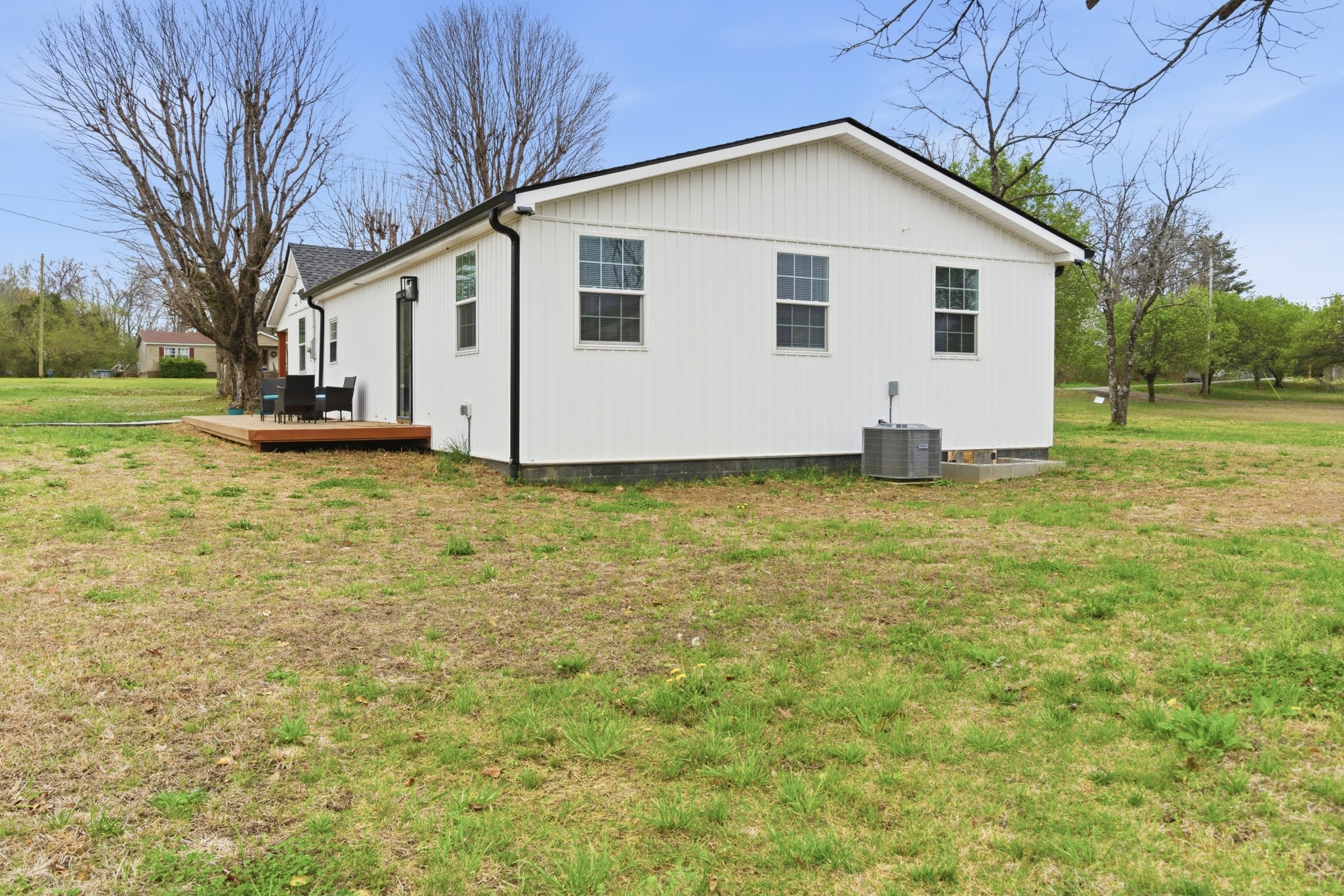 1237 Abiff Road Bon Aqua, TN 37025 - Photo 36 of 37 a view of a house with a yard