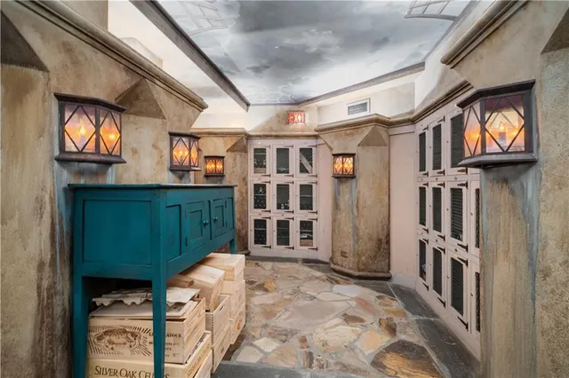 a view of a porch with furniture and front door