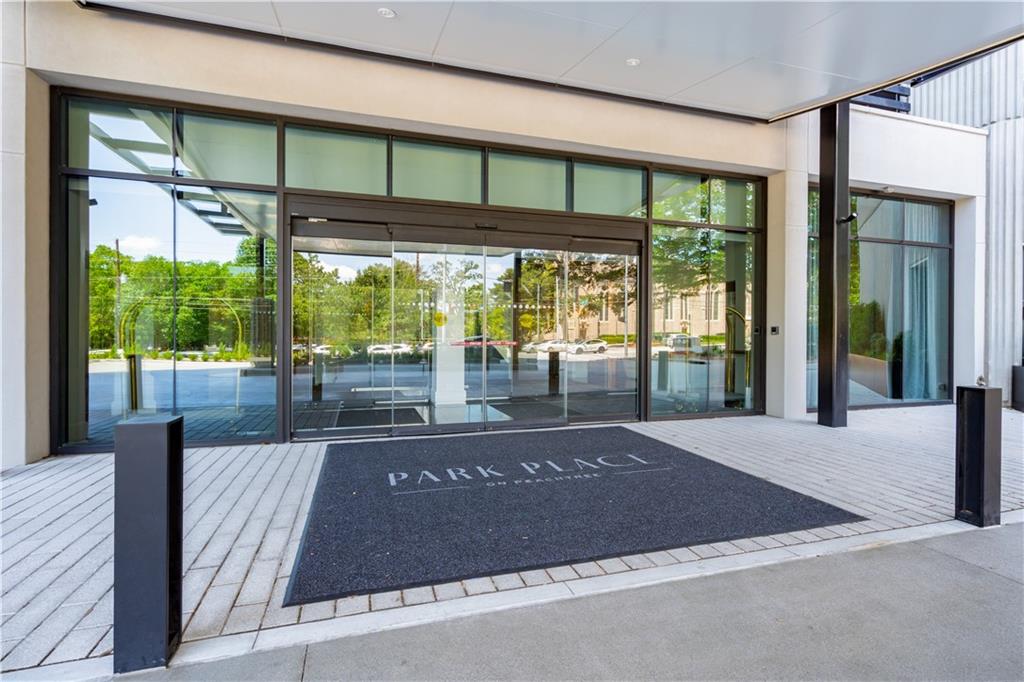 2660 Peachtree Road Northwest, Unit 32C Atlanta, GA 30305 - Photo 24 of 55 a view of porch with a black white door
